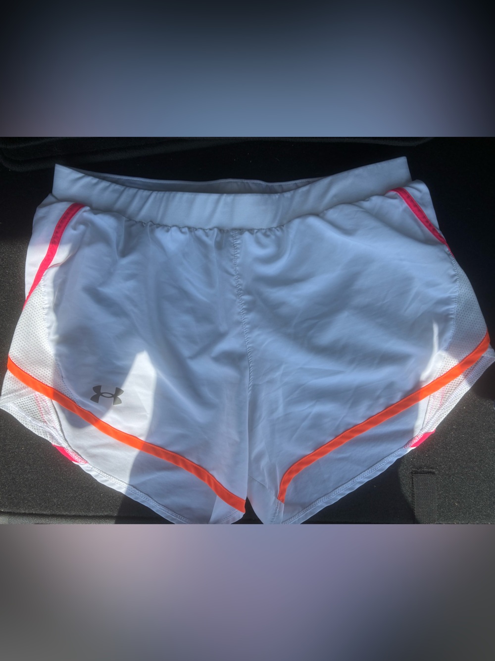 Under Armour women’s White Athletic Shorts with Orange and Pink Trim M
